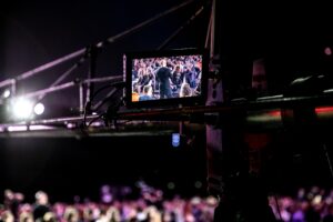 Behind the scenes footage of crane camera rig at event