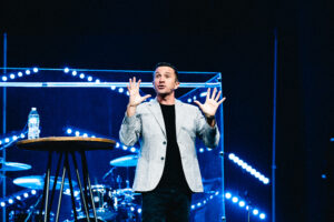 CEO gives talk at live conference thumbnail image used