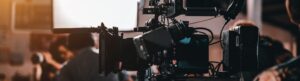 Stock photo banner featuring several professional cameras and lighting equipment