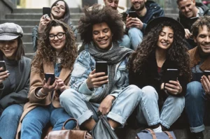 Socia Media, young group all checking their smart phones