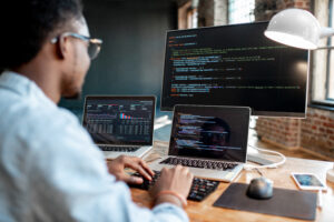 Programmer creates code for AI